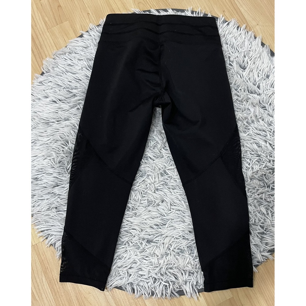 Athleta leggings Women's XS Black Cropped mesh inserts on legs Gym Yoga Sport